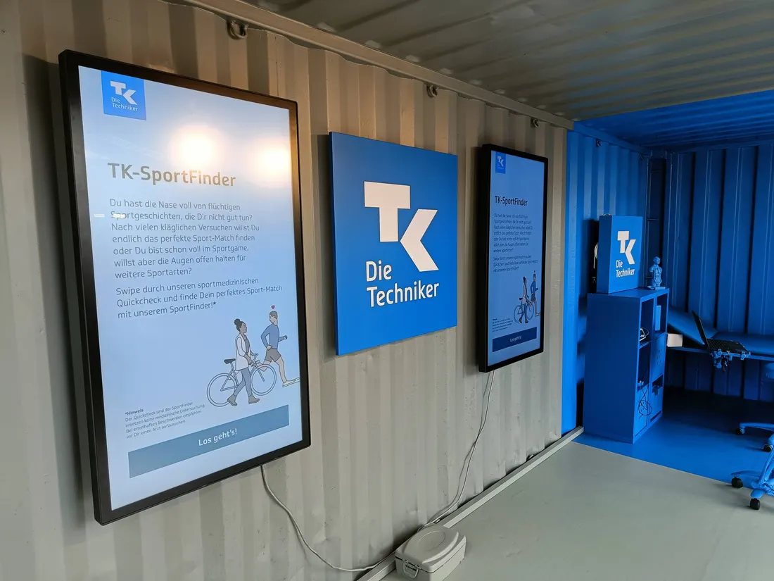 Touch-Screens in einem Messe-Container
